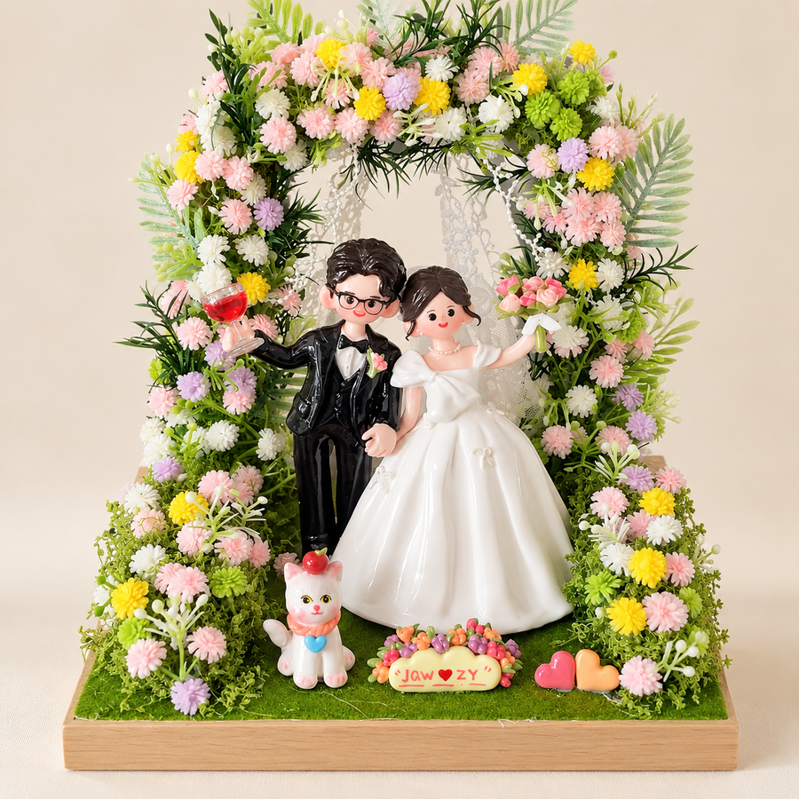 Custom bride and groom clay figurines under a pastel garden flower arch — design example
