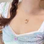 Custom pet clay necklace worn by a model, close-up styling